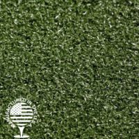 A close up of fake grass with a manufactured in the USA logo.