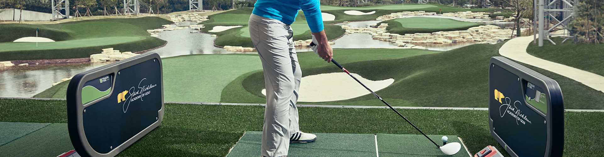 Southwest Greens artificial turf installation at a Jack Nicklaus Academy of Golf facility with TrackMan driving range bays