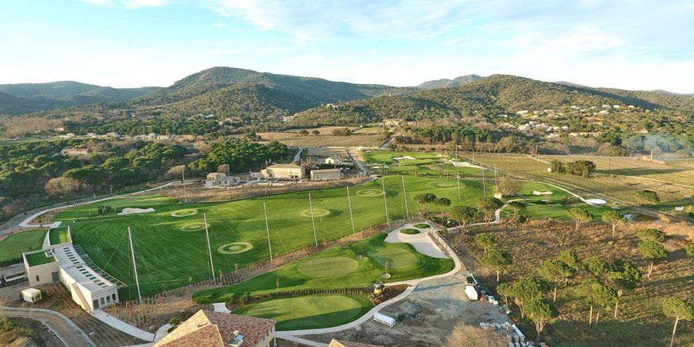 Pittsburgh Aerial view of a synthetic grass golf course surrounded by hills