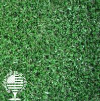 Dense, vibrant artificial grass with tightly woven blades, designed for realistic appearance and durable outdoor landscaping use.