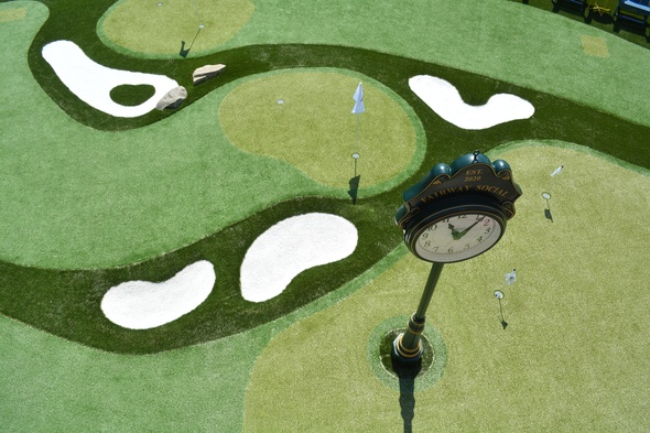 Pittsburgh Synthetic grass golf course with sand traps and golfers