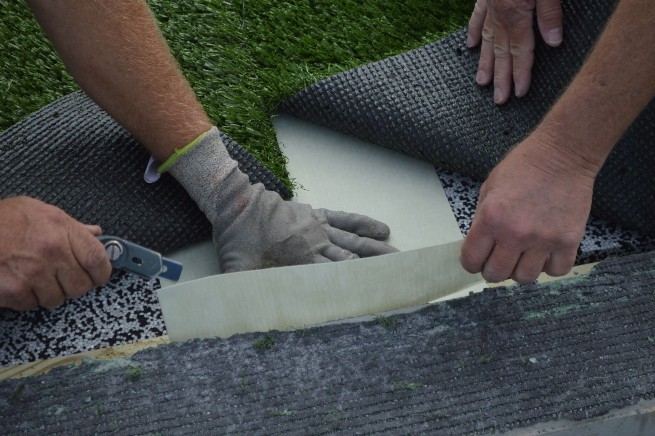 Pittsburgh artificial turf installation - cushion pad installation