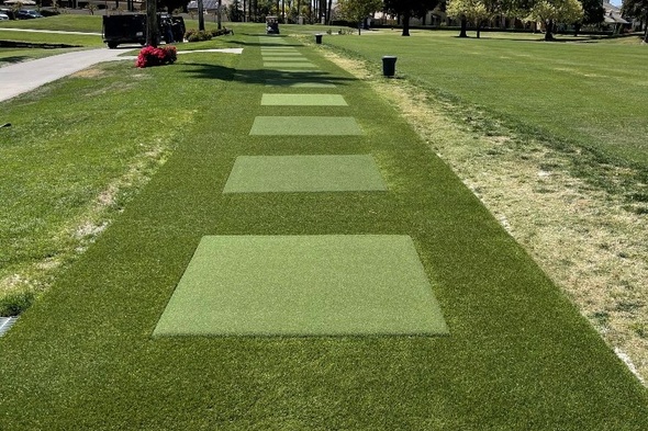 Pittsburgh Outdoor tee line with light green synthetic grass boxes inside a dark green synthetic grass strip